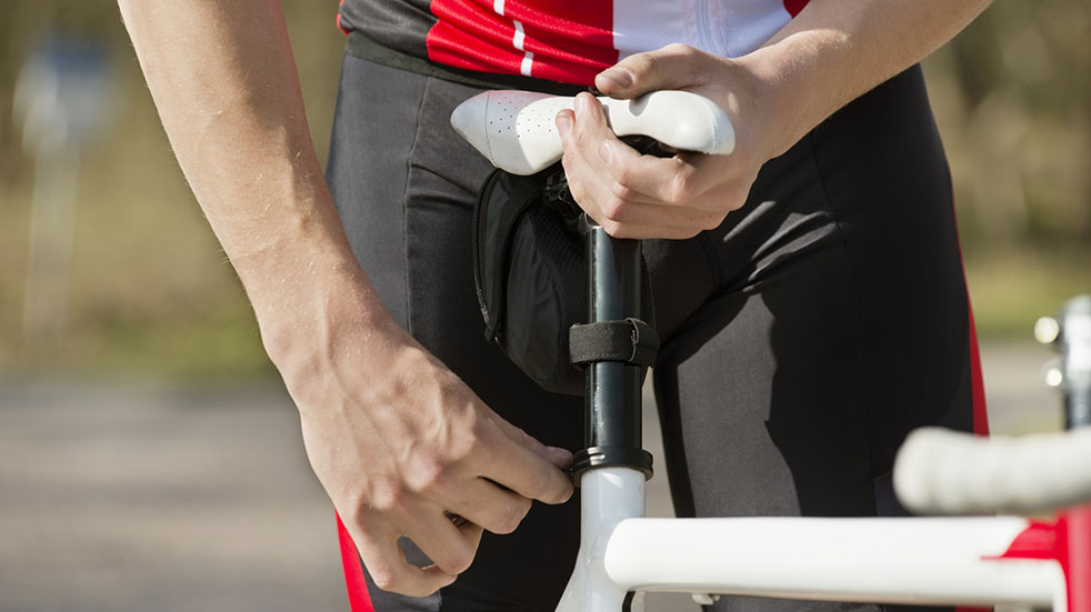 Bicycle maintenance; adjusting saddle height